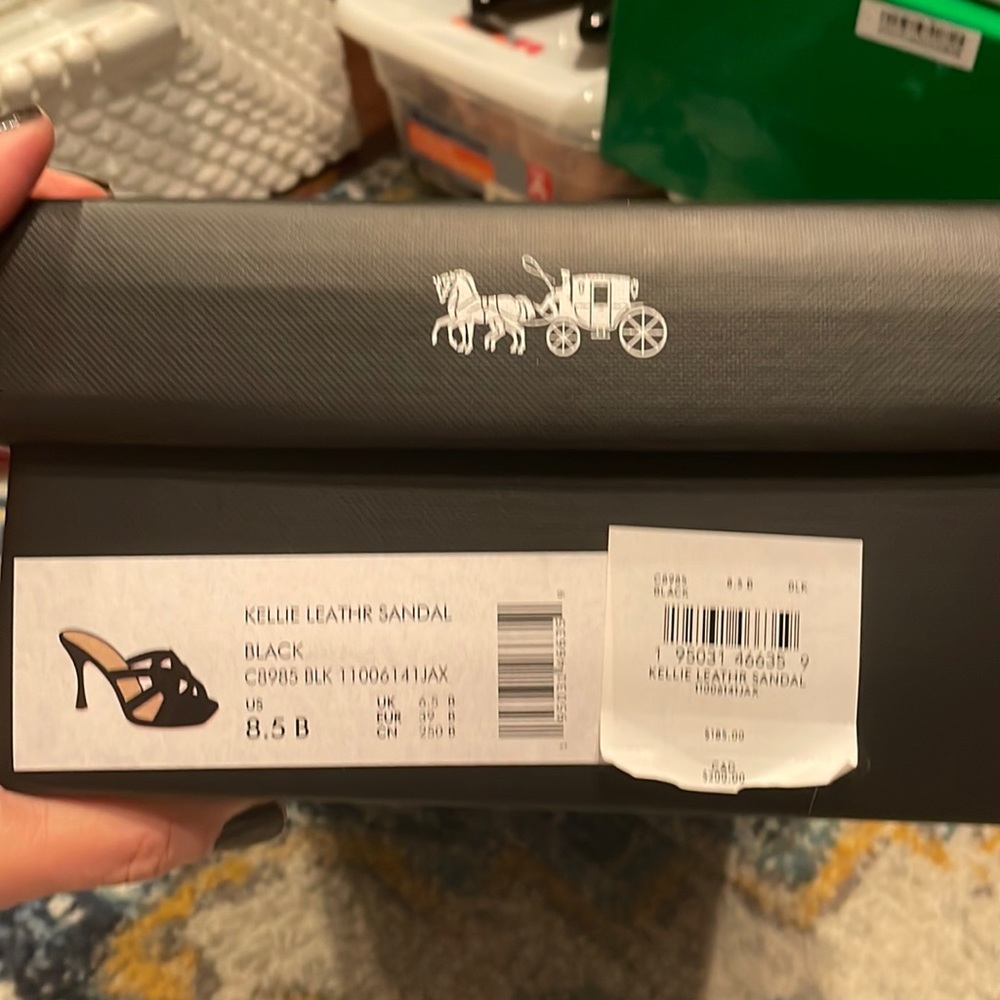 Brand new never been worn coach heels.